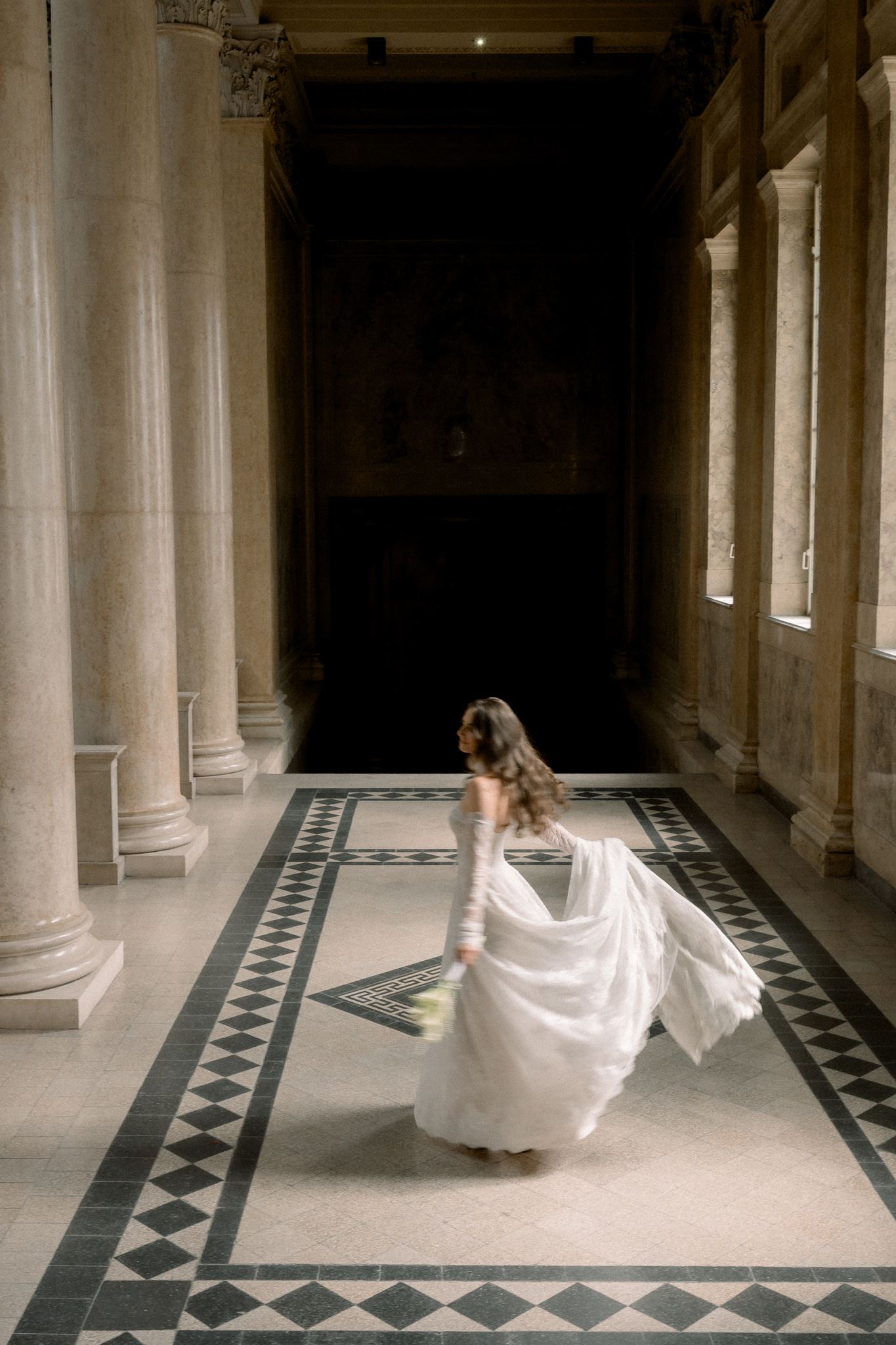 a bride twirling in the Museum of Fine Arts Budapest